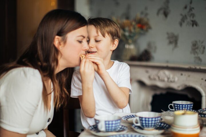 mother and child enjoying their pleasurable meal together